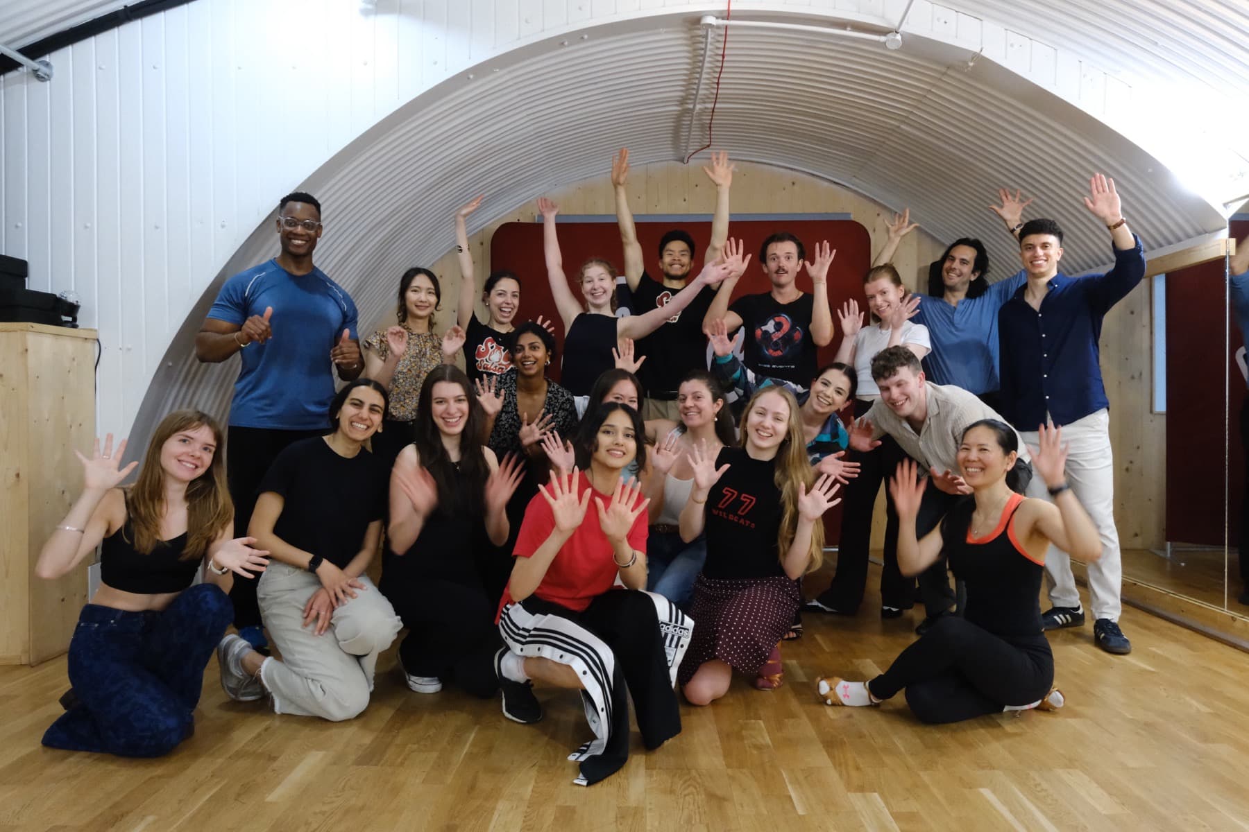 Beginners smiling together at a Soy Salsa salsa class in London