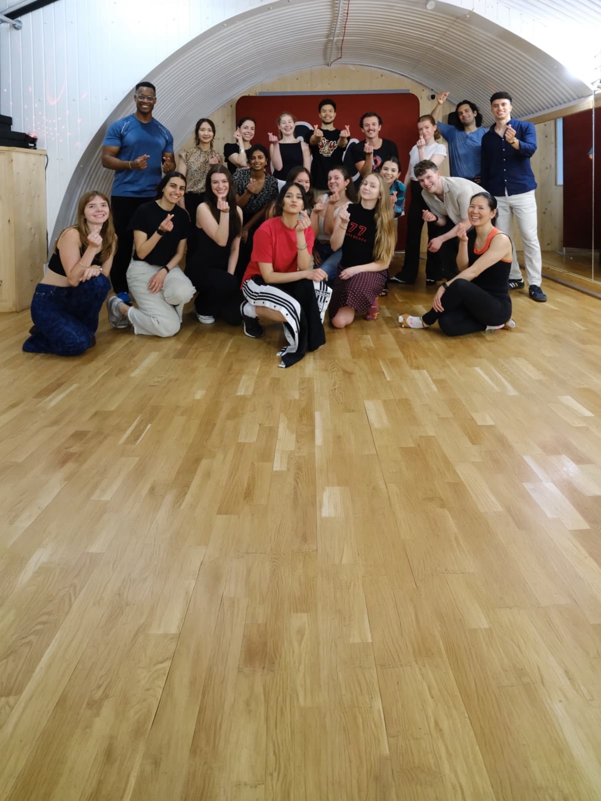 Beginners smiling together at a Soy Salsa salsa class in London