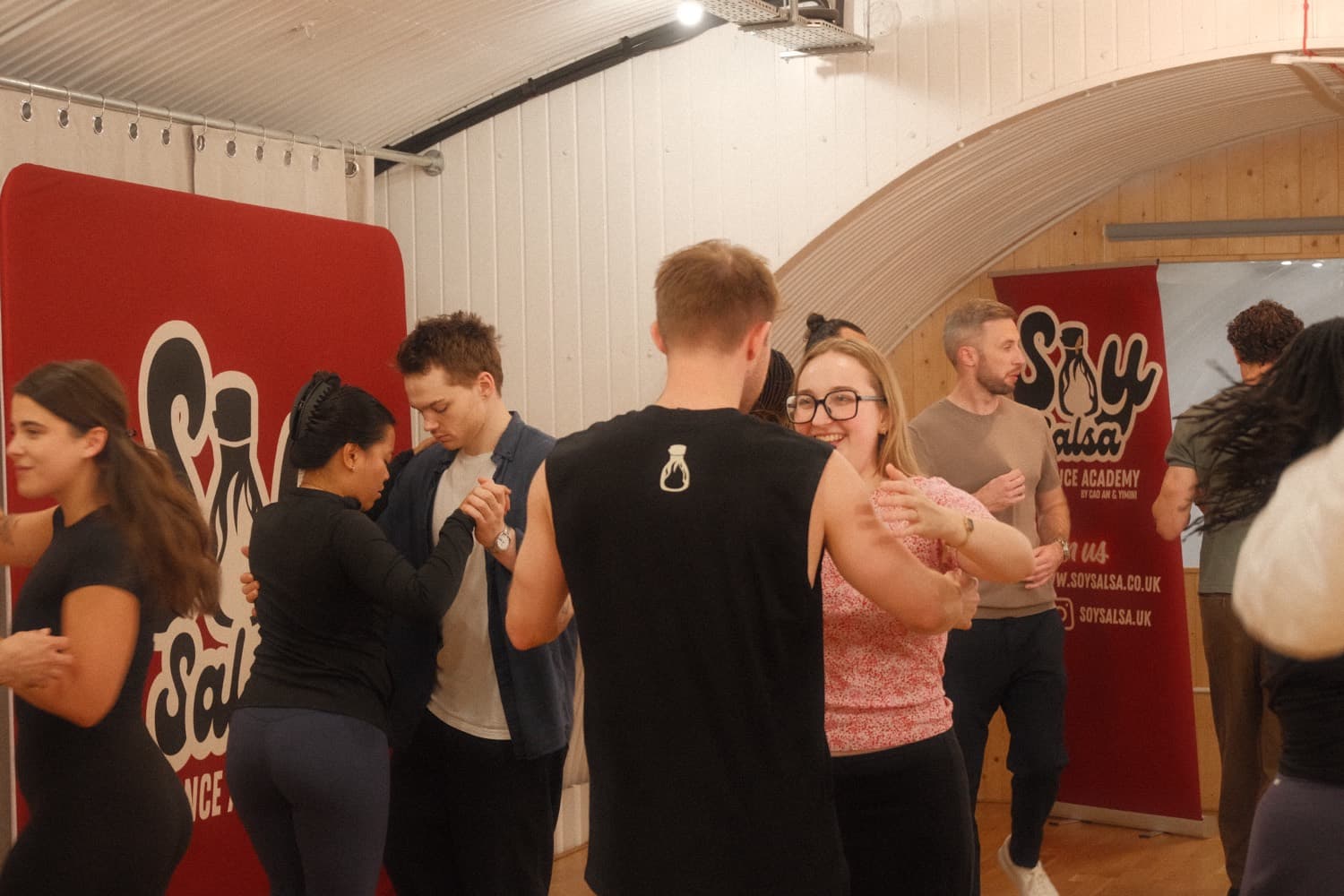 A Soy Salsa class dancing On2 in pairs